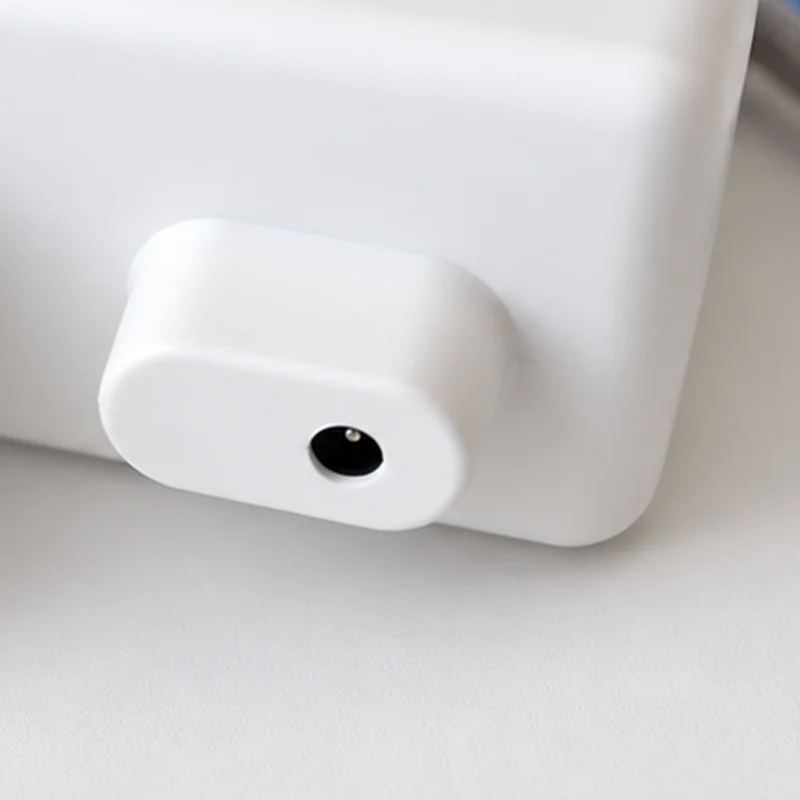 Close-up of the separate round DC power input on AirDry
